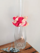 Load image into Gallery viewer, scrunchie displayed on bottle