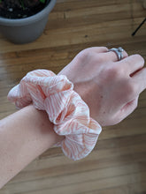 Load image into Gallery viewer, scrunchie on wrist