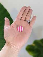 Load image into Gallery viewer, silk earring with pink and white stripe on palm