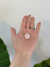 Load image into Gallery viewer, pink earring on a palm