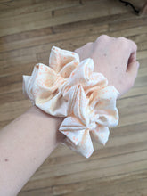 Load image into Gallery viewer, creamy colour scrunchie on the wrist
