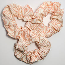 Load image into Gallery viewer, Hexagon Orange Silk Scrunchie
