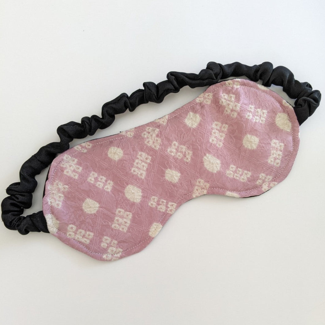 white and pink eye mask